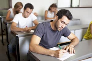 male student taking the Colorado real estate exam