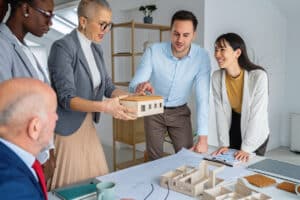 real estate team leader running a meeting