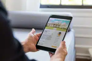 person looks for home using mobile real estate app