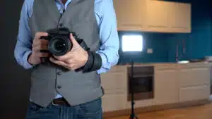 professional photographer taking photos of a home for sale