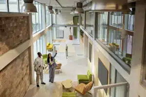 commercial real estate agent showing an office space to a client