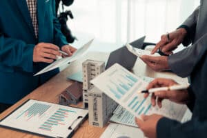 real estate agent meeting with investor clients
