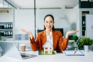 real estate agent at her desk working on her long-term career growth plan