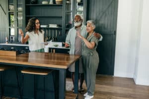 real estate agent showing a home to clients