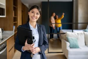 real estate agent showing a home to clients